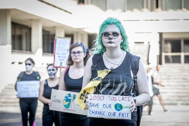 Portsmouth Extinction Rebellion marched to the civic offices to present a letter to Stephen Morgan and Penny Mordaunt asking them to put pressure on the government about climate change action on 25 June 2020.
Pictured: Protestors Alison Van Haeften, Eve McHugh, Amberley Rankin and Selma Heimedinger outside Portsmouth Guildhall.
Picture: Habibur Rahman