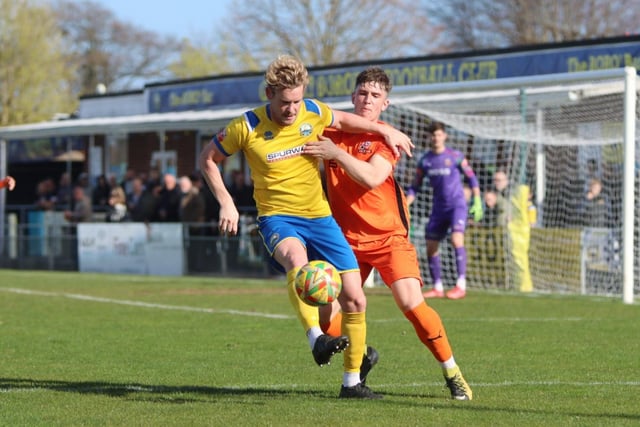 Gosport's Charlie Wassmer in action against Hartley Wintney. Picture by Tom Phillips