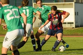 Callum Glen, right, was sent off in the first half for US Portsmouth against Totton & Eling. Picture: Keith Woodland