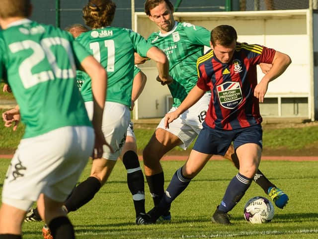 Callum Glen, right, was sent off in the first half for US Portsmouth against Totton & Eling. Picture: Keith Woodland