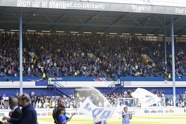 The Leppings Lane end starts to fill up before the players come out.