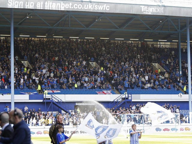 The Leppings Lane end starts to fill up before the players come out.