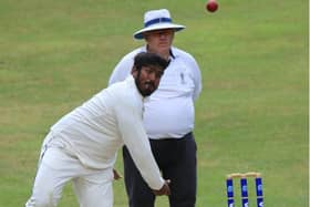 Minhaj Jalill in bowling action during Portsmouth's SPL Division 1 victory at Ventnor. Picture by Dave Reynolds