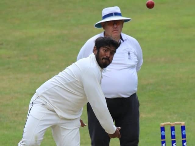 Minhaj Jalill in bowling action during Portsmouth's SPL Division 1 victory at Ventnor. Picture by Dave Reynolds
