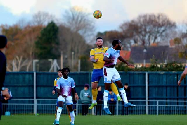 Ryan Woodford goes up for a header. Picture by Tom Phillips