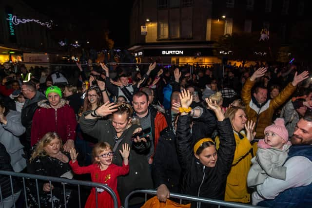 Crowds joining in with the singing. Picture: Mike Cooter (181121)