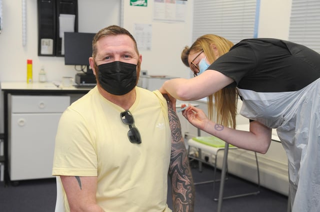 More than two million vaccines have been given out in Hampshire and the Isle of Wight.
Pictured is: Dean Fitzgerald (47) from Hilsea getting his vaccine at Lalys Pharmacy in Portsmouth.
Picture: Sarah Standing (220421-7039)