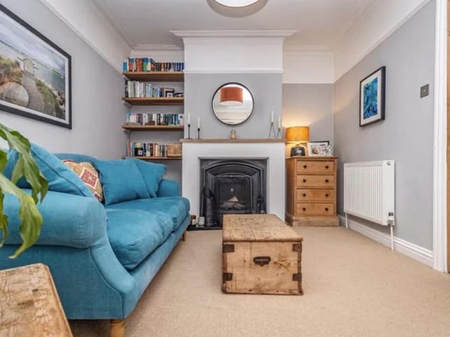 The listing says: "The attention to detail is second to none in our opinion, providing beautifully stylish and elegantly finished living spaces, including a bright and airy sitting room a large bay window and feature fireplace, alongside an attractive open plan kitchen/ dining area, complete with breakfast bar and double doors opening into the enclosed, well kept west facing garden."