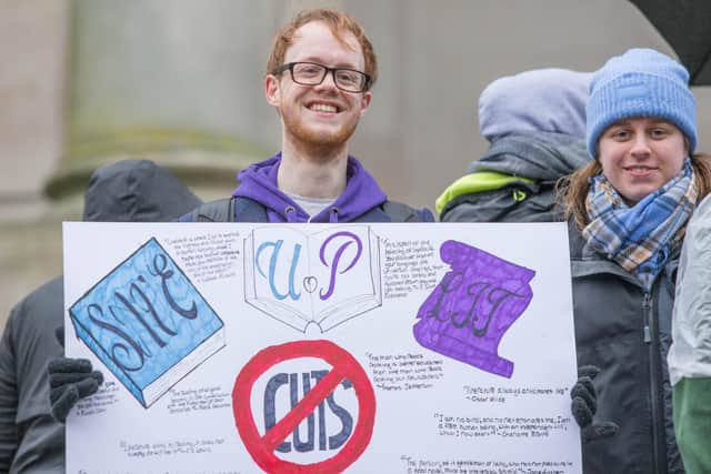 Amy Thomson, 21, alongside fellow protester Andre Buller, 21.
Picture: Habibur Rahman