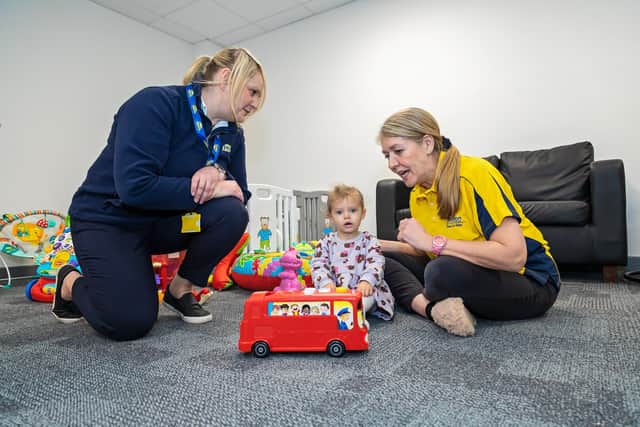 Sarah Moulds (Centre Manager) with Pearl (2) and Adele Starkey. Picture: Mike Cooter (210122)
