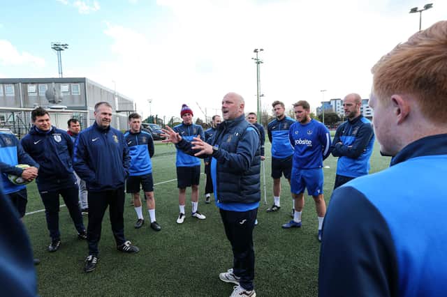 Manager Glenn Turnbull talks to his US Portsmouth squad ahead of Tuesday's training session at HMS Temeraire. Picture: Chris Moorhouse