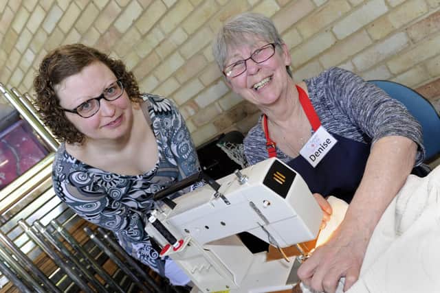 Denise Taylor fixing a curtain with her sewing machine. Picture: Ian Hargreaves  (200419-3)