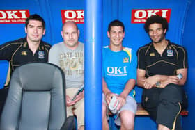 Richard Hughes, left, and David James, right, with a couple of fans. Picture: Faz Ahmed