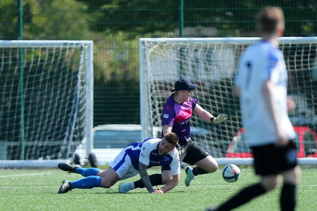 Clanfield keeper Ashley Wright was booked for this foul. Picture: Chris Moorhouse