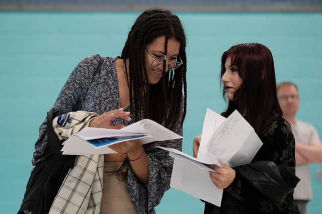UTC Portsmouth pupils achieved the college's best ever set of GCSE results this year. Pictured left to right is: Aisha Osman and Faith Chapman. Photo: Matt Scott-Joynt