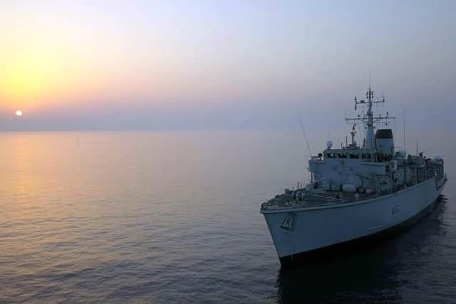 HMS Ledbury sailing in the Gulf at sunset. Photo: Royal Navy