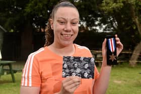 Pictured: Penny Cornell with her grandfather's medal.
Photo: Simon Czapp/Solent News & Photo Agency