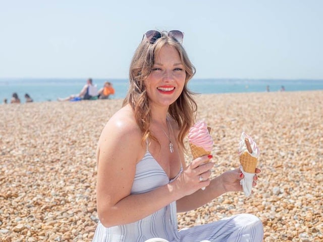 Carrie Nightingale enjoying a couple of ice creams on Southsea beach