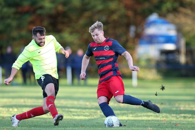 Jay Eames, right, in action for Paulsgrove against Bush Hill in December. HPL clubs will be told on Friday the proposal(s) for finishing the 2020/21 campaign. Picture: Chris Moorhouse