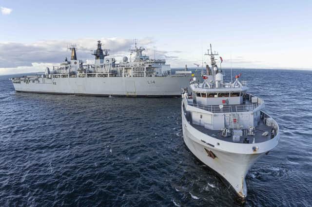 The FS Garonne towing assault ship HMS Albion on November 4, 2021.
Picture: Terence Wallet