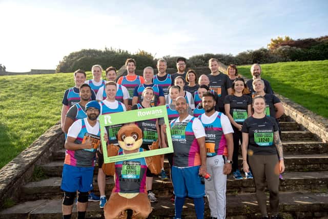 Reporters from The News and volunteers from Rowans Hospice completed the Great South Run together in 2019. Picture: Vernon Nash (201019-022)