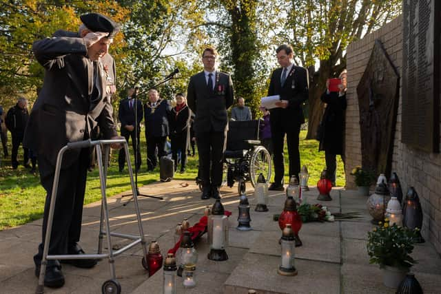 Otton Hulacki, 99 salutes after a wreath is laid on his behalf. Picture: Keith Woodland (071121-110)