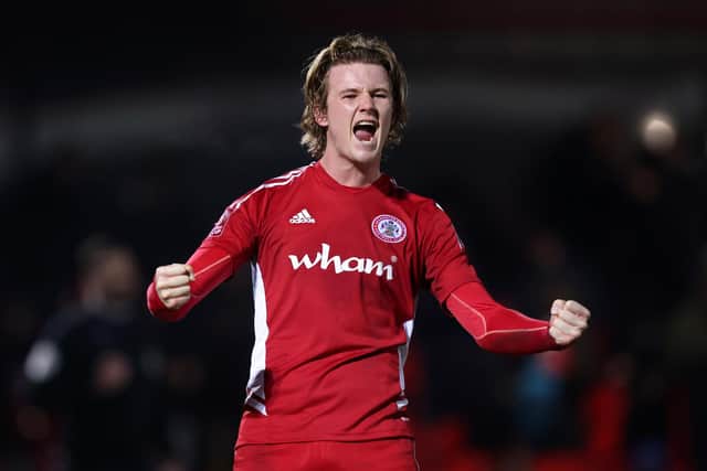 Tommy Leigh celebrates Accrington's victory over Boreham Wood that set up tomorrow's FA Cup visit of Leeds United. Photo by George Wood/Getty Images
