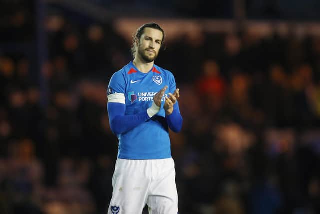 Christian Burgess is one of 10 players whose contracts end in the summer - which could affect their Pompey involvement in an extended season. Picture: Joe Pepler