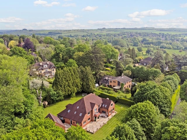 Originally built in 1969, this attractive and substantial house is positioned centrally within a large plot and it comes with six bedrooms, five bathrooms and six reception rooms.
