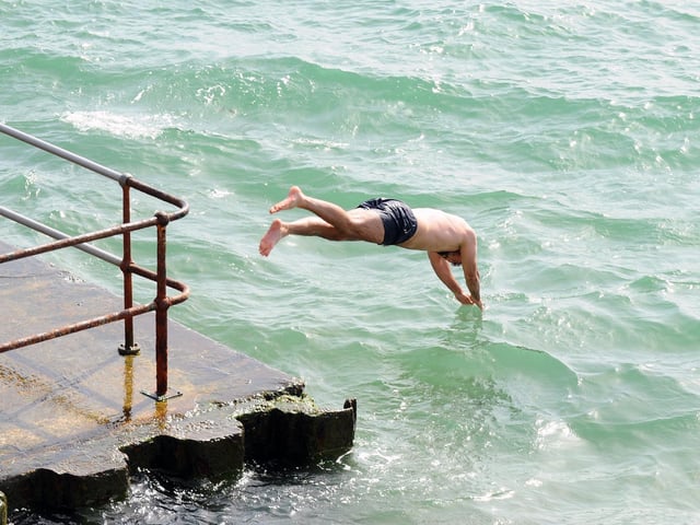 Cooling off in Old Portsmouth
Picture: Sarah Standing (050923-1429)