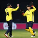 James Vince celebrates with Ben McDermott after Hampshire had taken a Glamorgan wicket last night. Photo by Ryan Hiscott/Getty Images