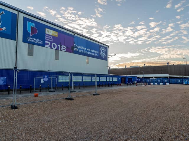 Pompey's North Stand and its car park pictured in 2021. CEO Andy Cullen believes a walkway from Fratton railway station is essential for the club to renovate the stand. Picture: Mike Cooter.