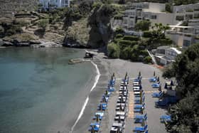 Greece has updated its travel restrictions for tourists. This photograph shows sunbeds on a beach in the fishing village of Bali near Heraklion, town in the island of Crete on May 14, 2021. Picture: Louisa GOULIAMAKI/AFP via Getty Images.