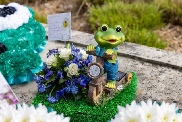 A flower arrangement featuring a frog, in reference to Jax's nickname "The Little Frog". Picture: Mike Cooter (160324)