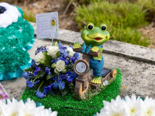 A flower arrangement featuring a frog, in reference to Jax's nickname "The Little Frog". Picture: Mike Cooter (160324)