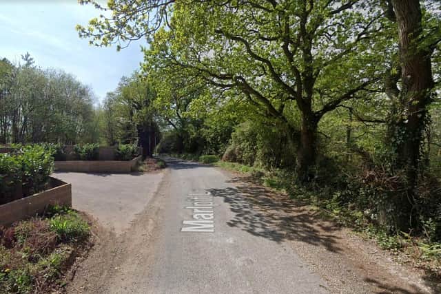 The victim, 47, was found by officers in Marlpit Lane and was taken to hospital by air ambulance. He has since died in hospital. Picture: Google Street View.