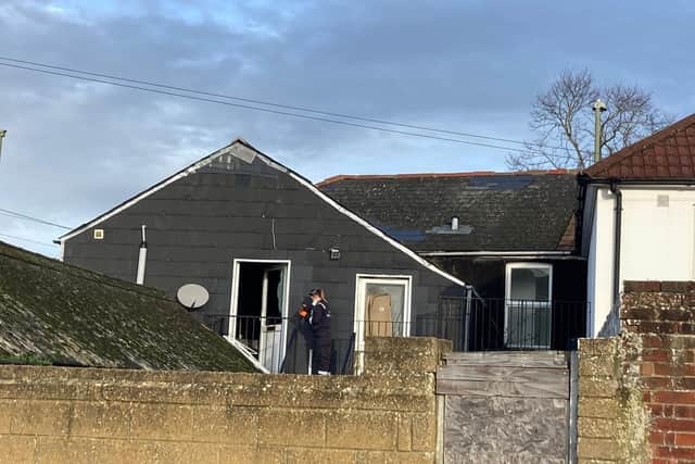 Police and fire investigators at a flat in Durham Street, Gosport, after a blaze at around 2.30am on January 1, 2022. Picture: Steve Deeks