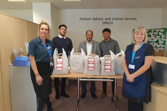 NHS staff at Queen Alexandra Hospital in Cosham with food that was delivered by Fareham-based Baburchi Indian Takeaway. 