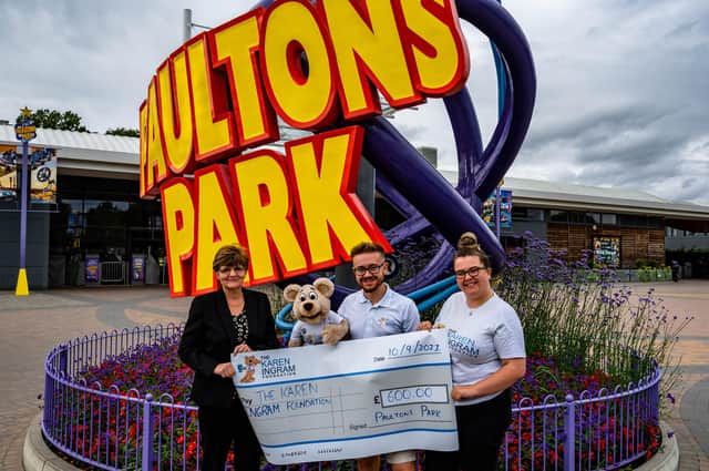 Tom Ingram and Emily Weston from The Karen Ingram Foundation pictured with Sara Mancey, HR Director for Paultons Park