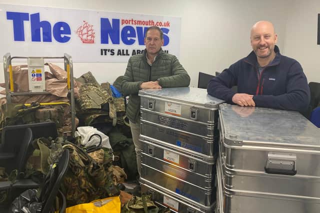SBS veterans Simon Roland and Neil Strang in The News's office after donating about £60,000 of body armour from their private security company Veritas International