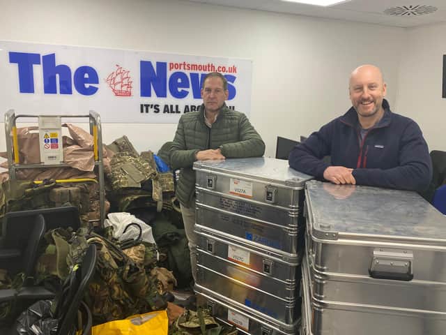 SBS veterans Simon Roland and Neil Strang in The News's office after donating about £60,000 of body armour from their private security company Veritas International