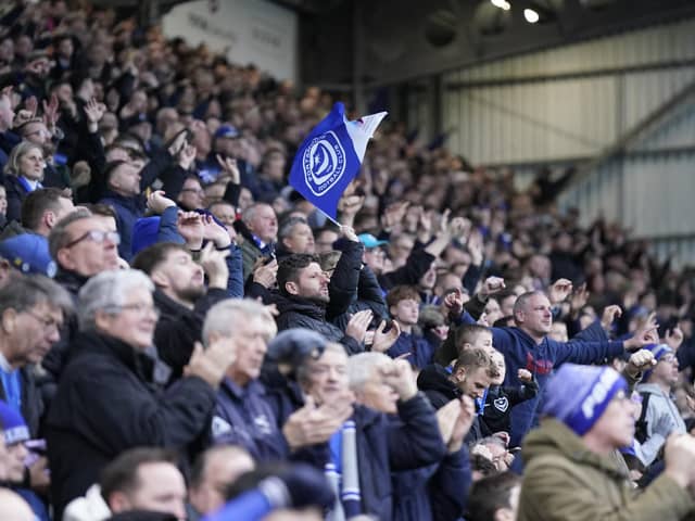 Check out our brilliant gallery as Pompey fans roared their team on to victory over Northampton. Pics: Jason Brown.