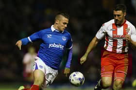 Miles Storey in action against Stevenage in October 2014. He made 22 appearances for Pompey on loan from Swindon - and is now at FA Cup opponents Hereford. Picture: Joe Pepler