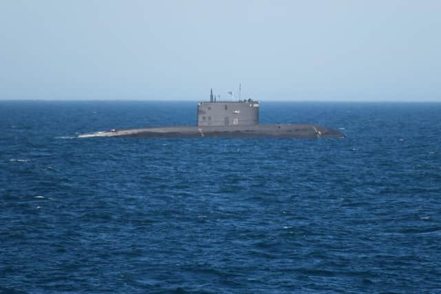 Russian attack submarine RFS Rostov Na Donu being monitored by HMS Mersey. Royal Navy/Crown Copyright/PA Wire