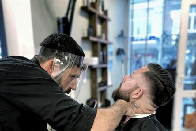 Andrei Budai from Silky Smooth Barbers in Southsea. Picture by Ivan Prothero