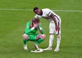 England goalkeeper Jordan Pickford stands dejected with  Raheem Sterling following the UEFA Euro 2020 Final at Wembley Stadium, London. Picture: Mike Egerton/PA Wire