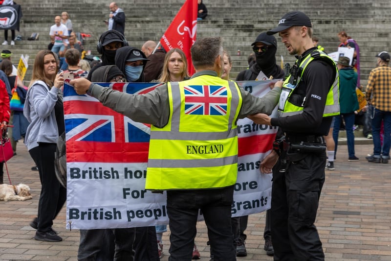 Police try to subdue any tension between the two groups.