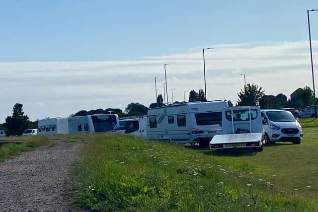 Travellers pictured at Milton Common on Thursday evening.