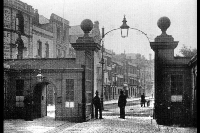 Inside looking out. A view from inside the dockyard main gate around 1920.