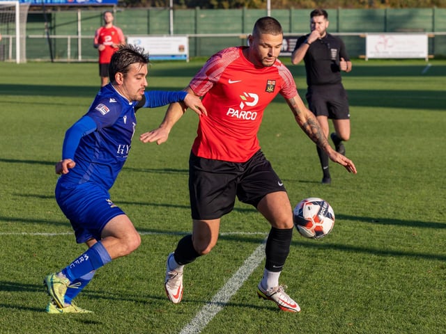 Fareham (red) v Baffins Milton Rovers. Picture: Mike Cooter